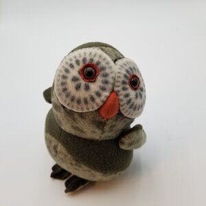 Threadbare owl soft sculpture made by Linda Bryant